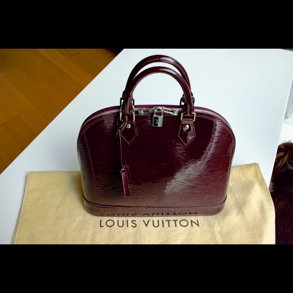 Louis Vuitton Alma Epi PM Handbag